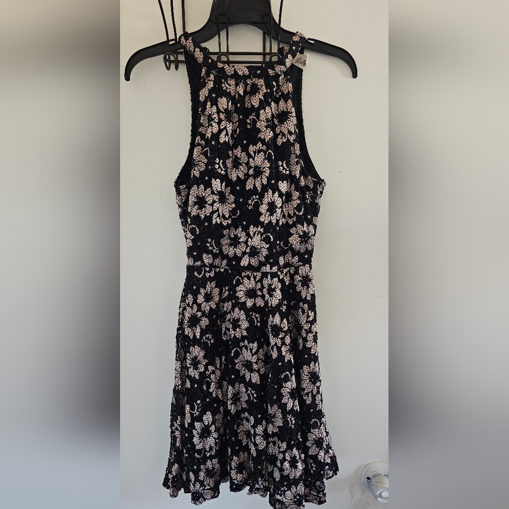 Black lace dress with cream flowers